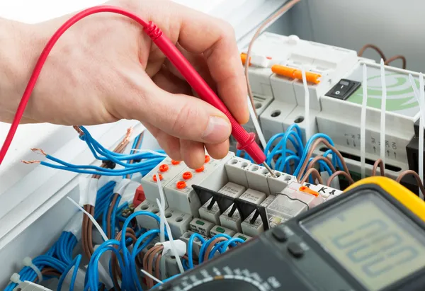 Electrician testing circuit breaker Pasadena CA
